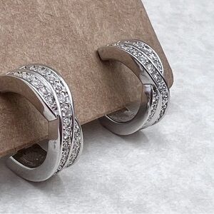 New on card Swarovski Signed Huggies earrings